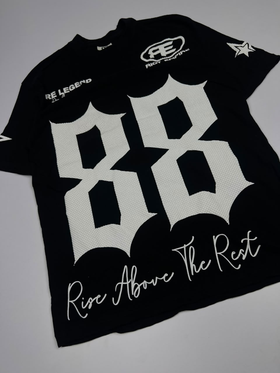 Graphic Print T-Shirt with Oversized Number Design and “Rise Above the Rest” Text
