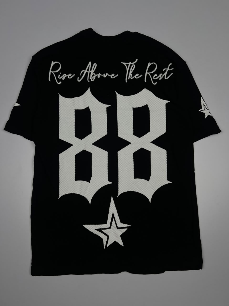 Graphic Print T-Shirt with Oversized Number Design and “Rise Above the Rest” Text