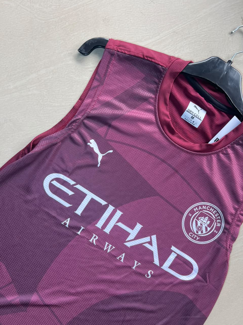 Manchester City Burgundy Sleeveless Training Jersey – Etihad Airways Edition