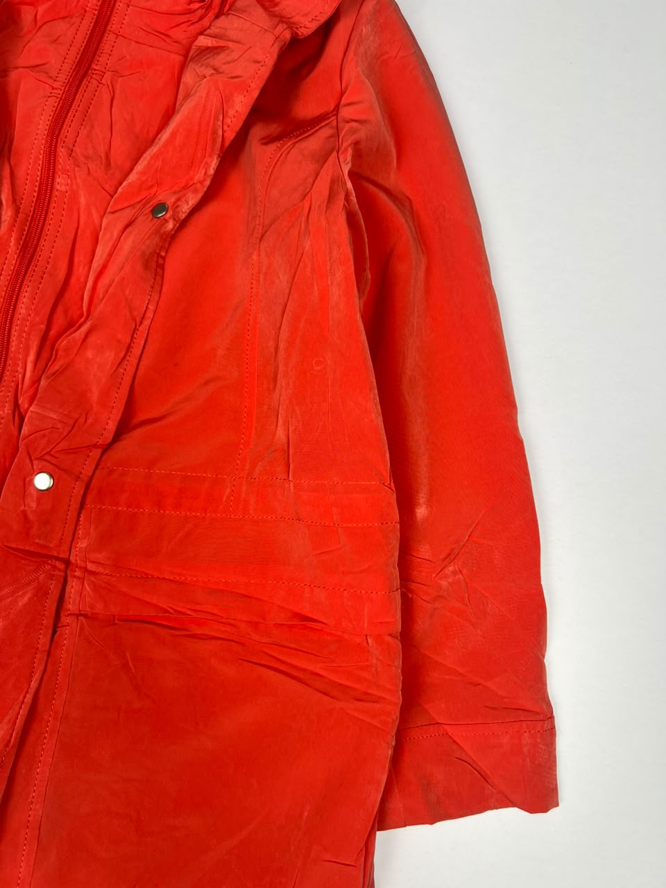 Red Long Hooded Winter Jacket with Front Zip and Button Closure