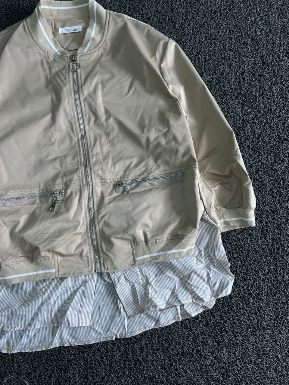 Oversized Beige Bomber with Striped Shirt Hem