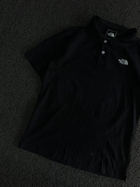 The North Face Black Polo T-Shirt – Classic Outdoor Style
