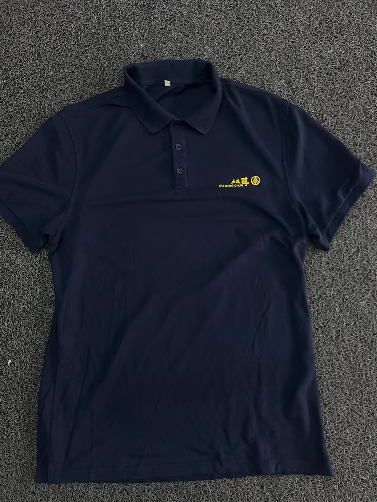 Men’s Navy Blue Solid Polo T-Shirt with Yellow Embroidered Logo