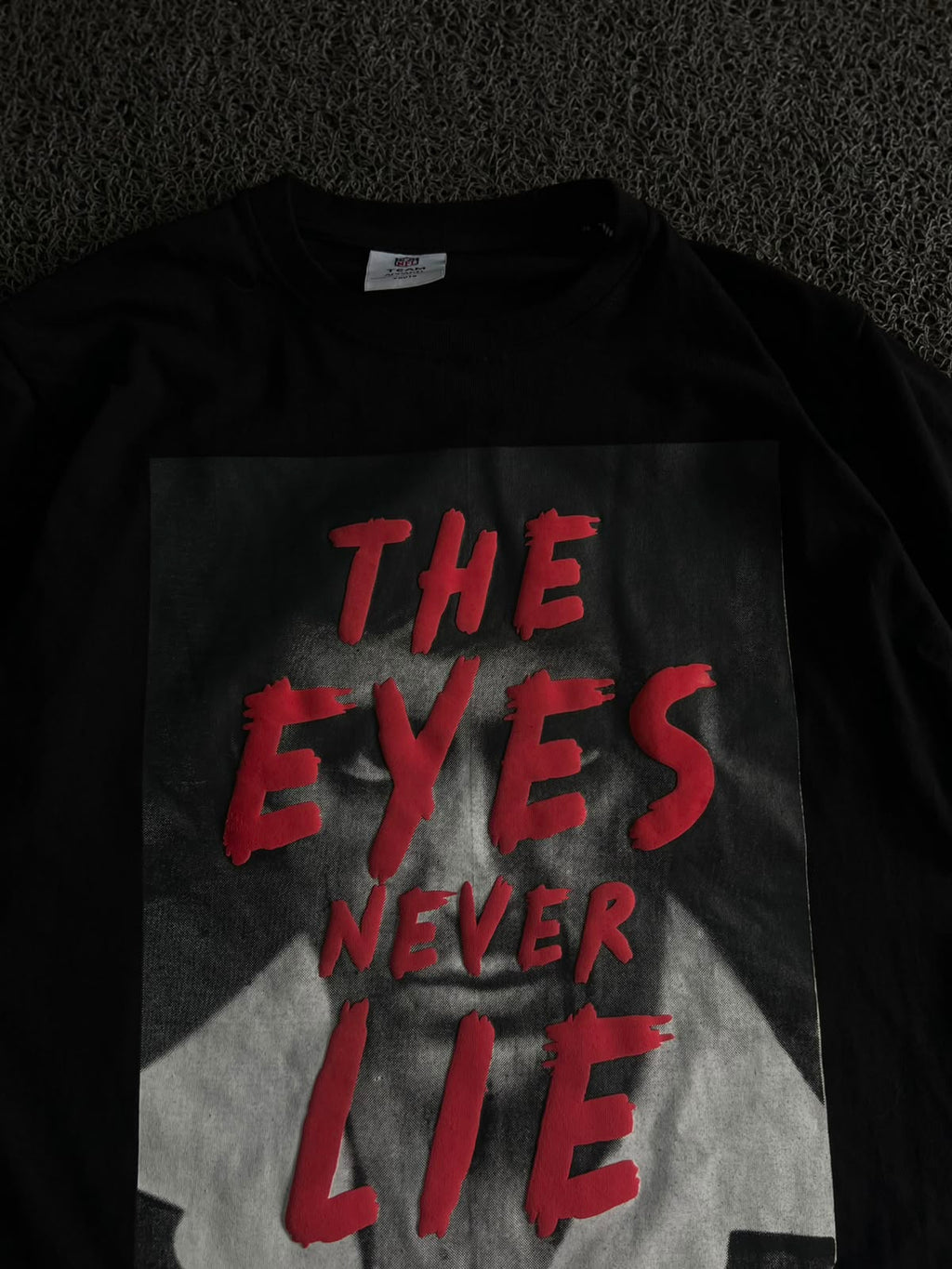 Graphic T-Shirt – "The Eyes Never Lie" Print
