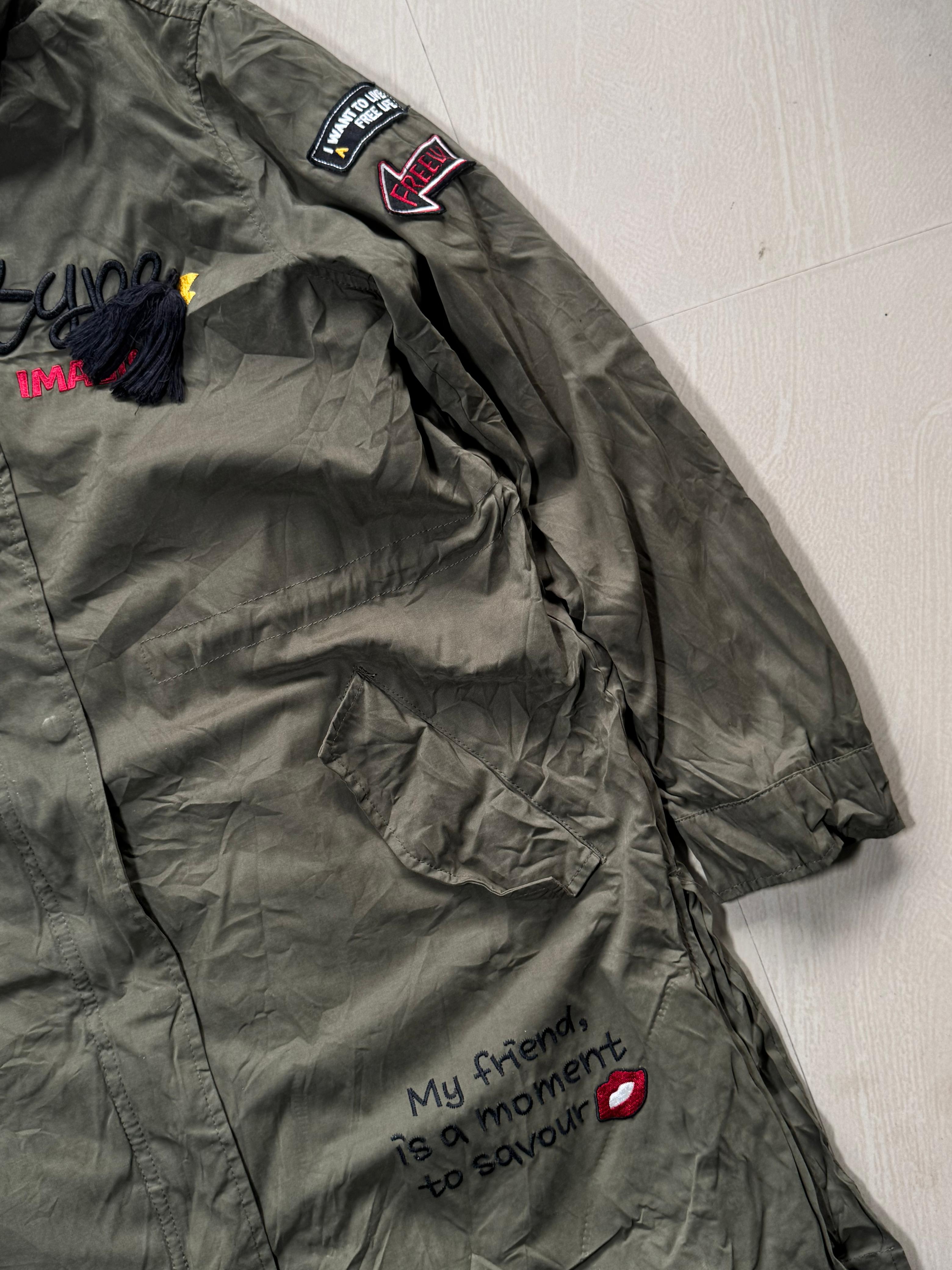 Longline Utility Jacket with Embroidered Patches – Full Sleeve, Stand Collar, Zip Front