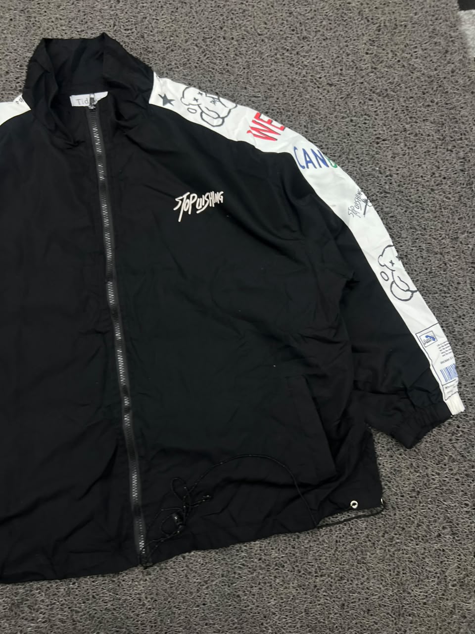 Stop Pushing Graphic Sleeve Black & White Zip-Up Windbreaker Jacket