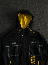 TeviA Black & Yellow Hooded Windbreaker Jacket – Lightweight Outdoor Jacket ⚠️ No Front Zip, Small Damage
