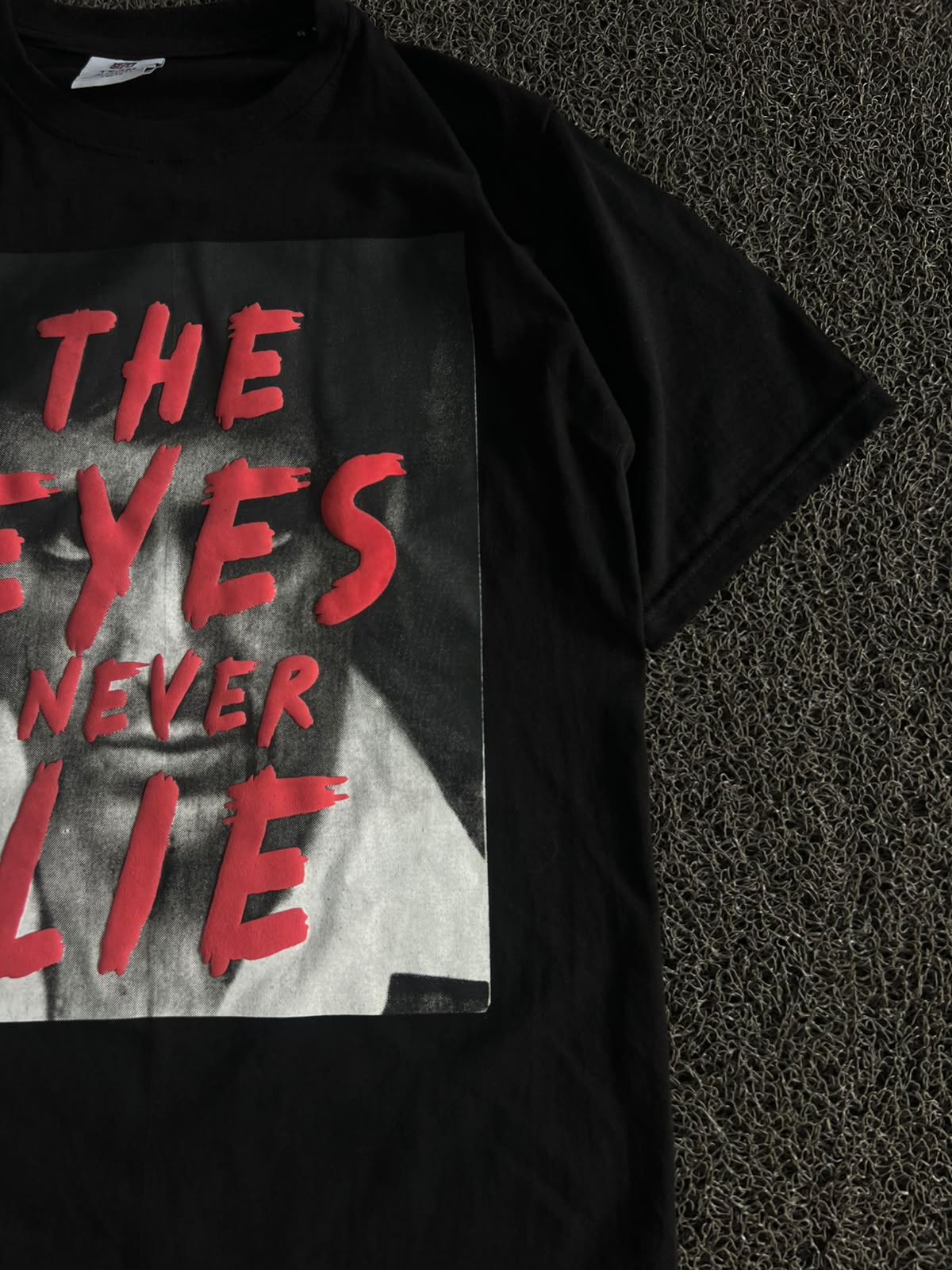 Graphic T-Shirt – "The Eyes Never Lie" Print