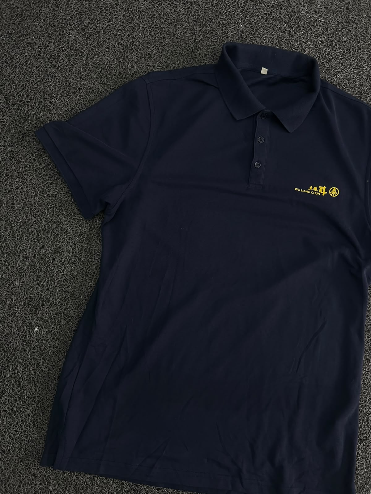 Men’s Navy Blue Solid Polo T-Shirt with Yellow Embroidered Logo