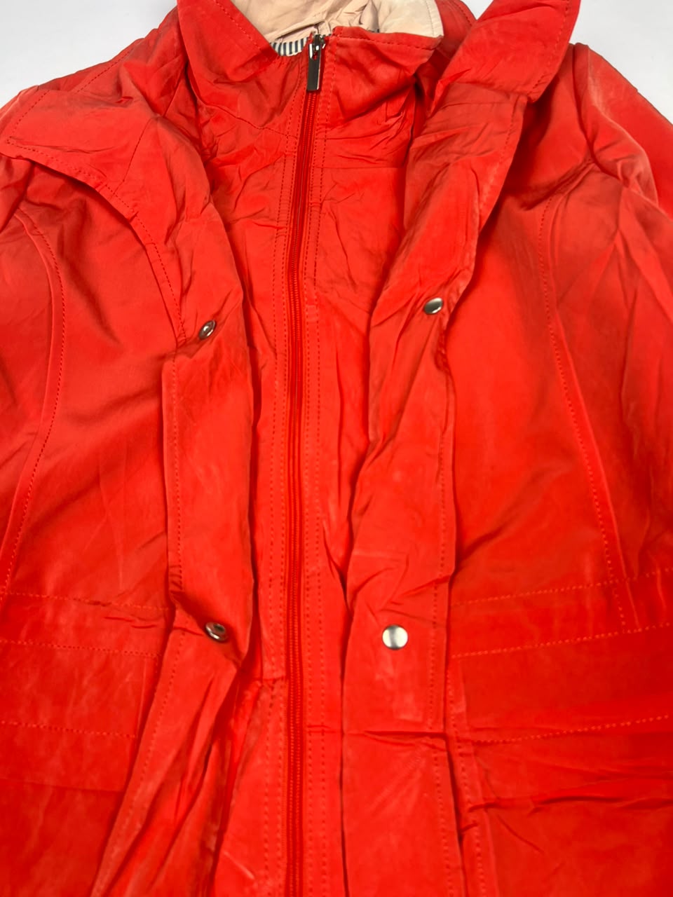 Red Long Hooded Winter Jacket with Front Zip and Button Closure