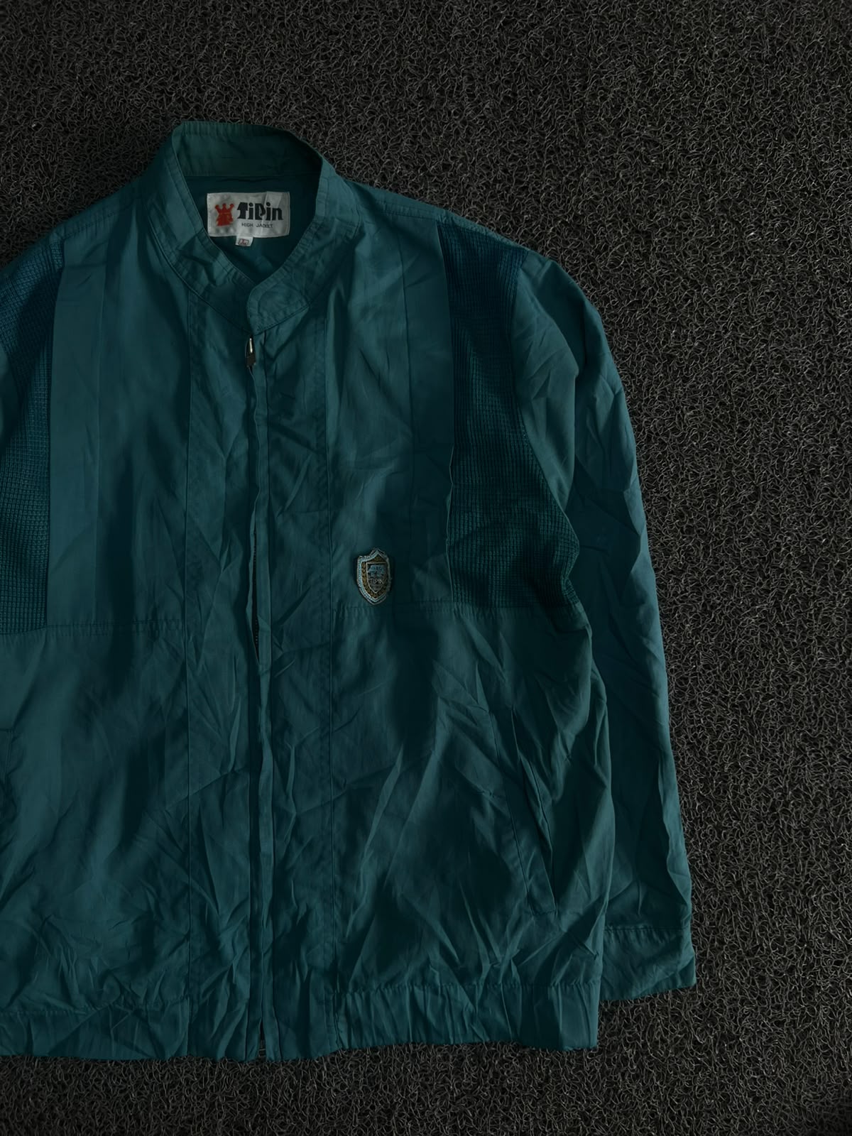 Lightweight Windbreaker Jacket with Stand Collar, Full-Zip Front & Embroidered Crest Logo