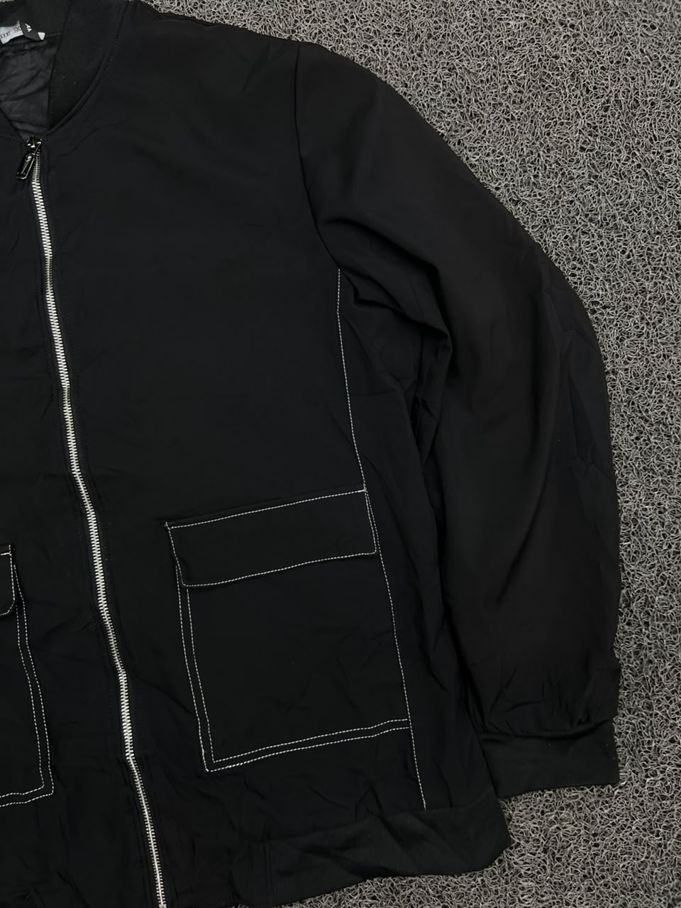 Minimalist Black Utility Zip Jacket with Contrast Stitching