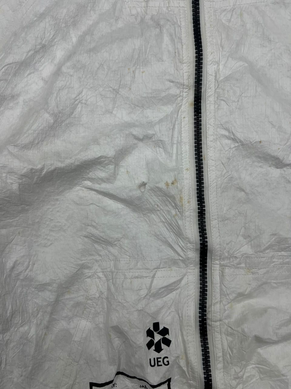 UEG White Graphic Hooded Windbreaker Jacket – Lightweight Full Zip Streetwear ⚠️ Small Stain and Damage