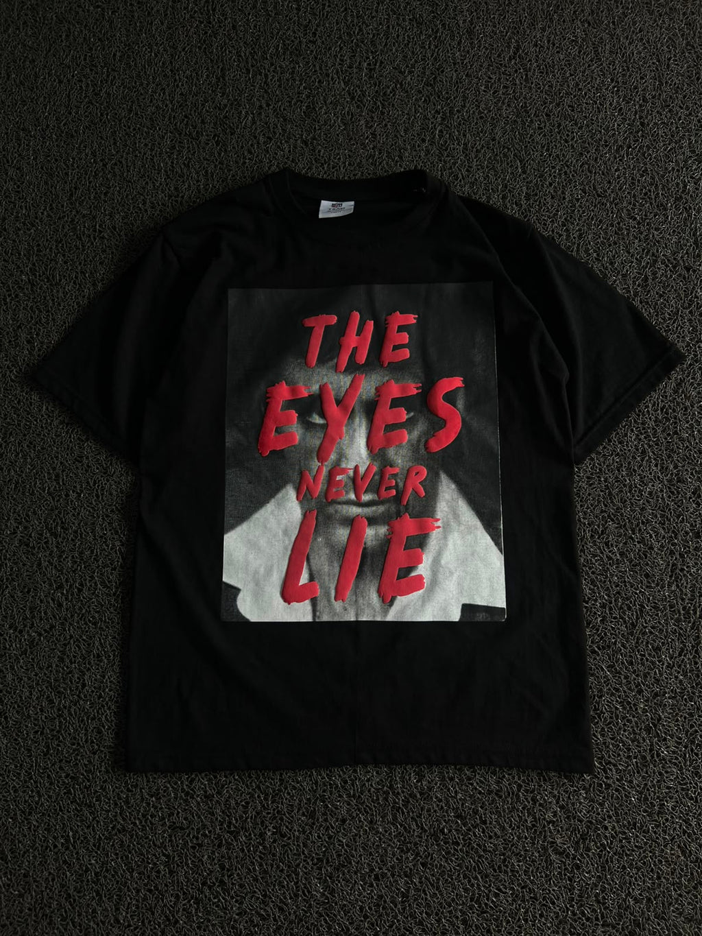 Graphic T-Shirt – "The Eyes Never Lie" Print