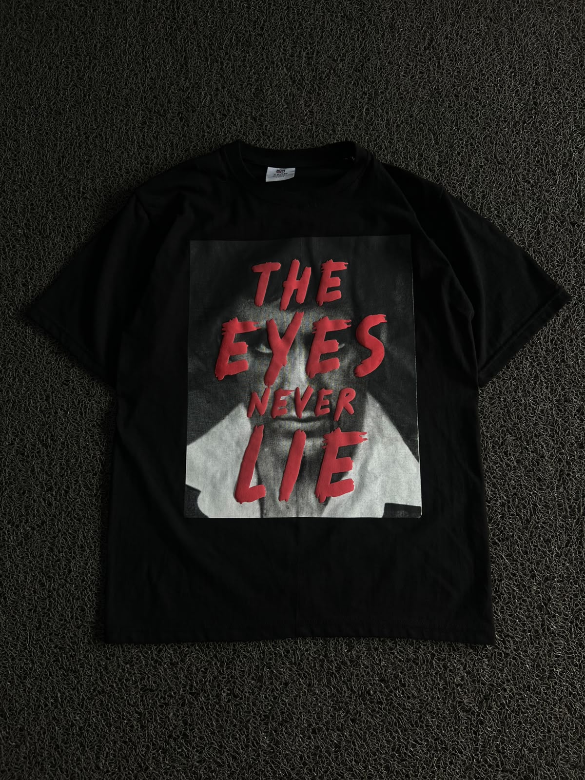 Graphic T-Shirt – "The Eyes Never Lie" Print