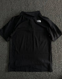 The North Face Black Polo T-Shirt – Classic Outdoor Style