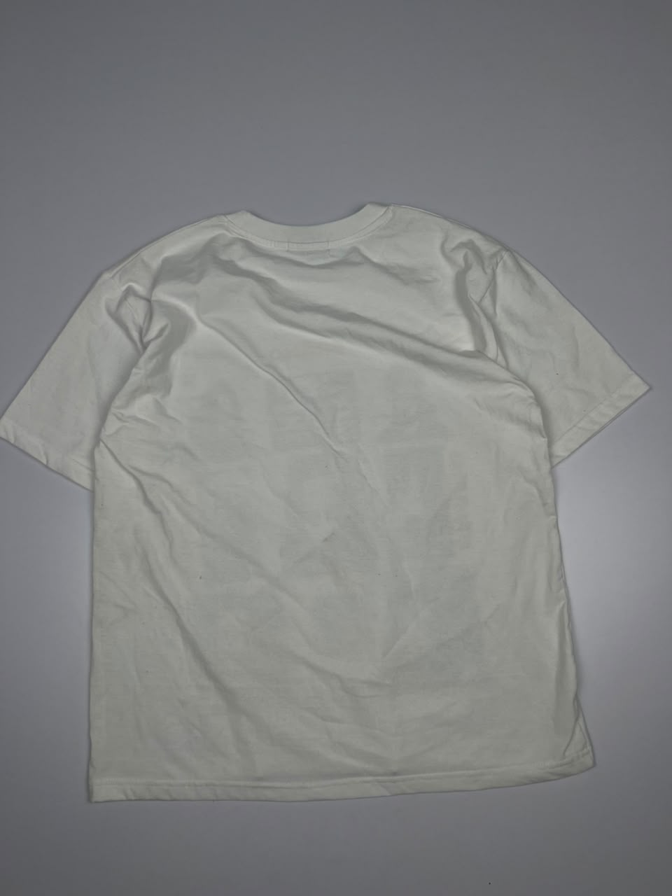 Graphic T-Shirt with Black Portrait Prints and Red Brand Text – Streetwear Style