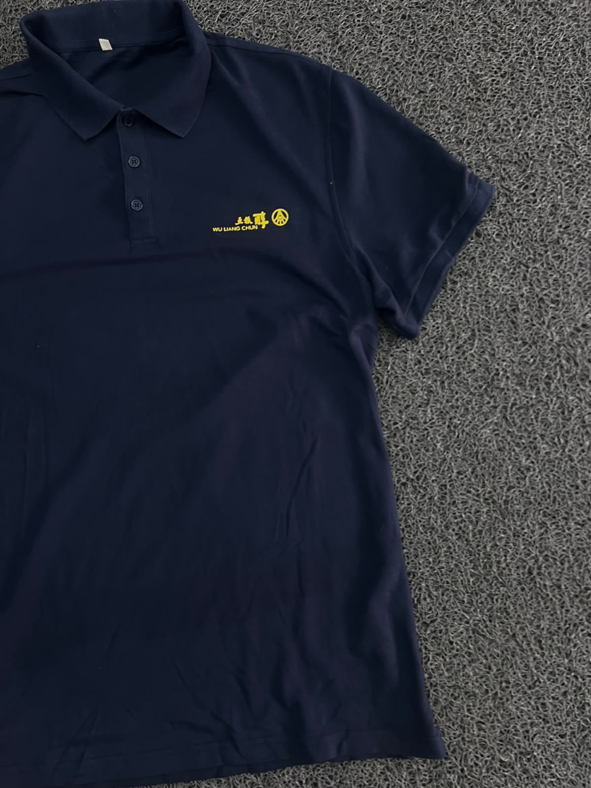 Men’s Navy Blue Solid Polo T-Shirt with Yellow Embroidered Logo