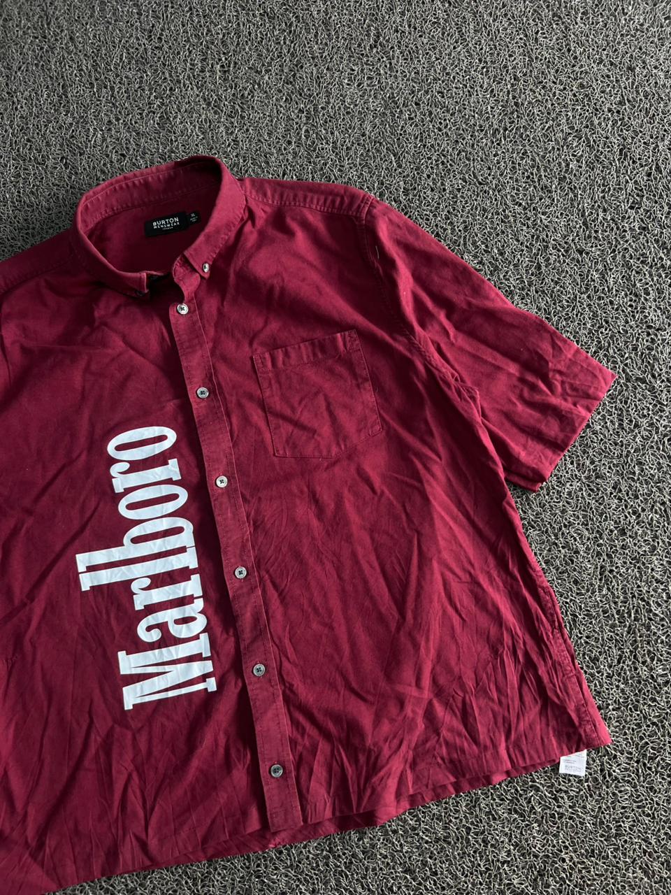 Menswear short-sleeve button-up with a bold Marlboro graphic print.