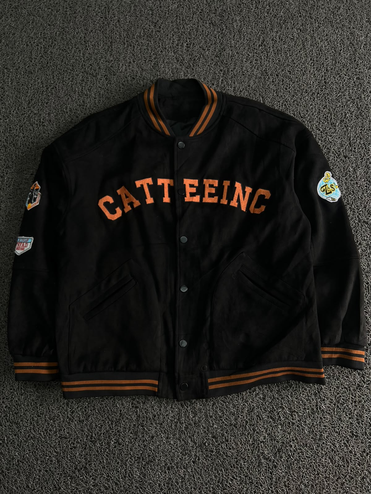 CATT EEINC Black Varsity Snap Jacket – Orange Lettering & Patch Detail