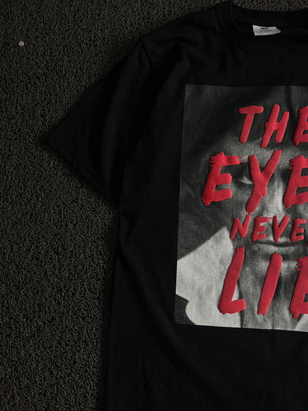 Graphic T-Shirt – "The Eyes Never Lie" Print