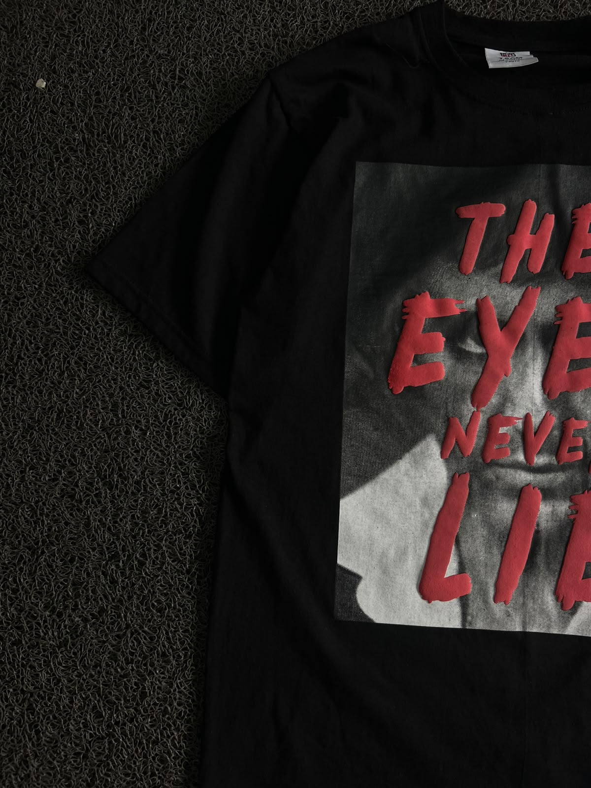 Graphic T-Shirt – "The Eyes Never Lie" Print