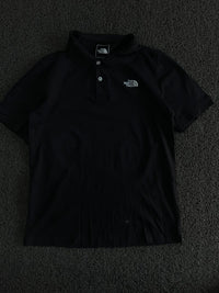 The North Face Black Polo T-Shirt – Classic Outdoor Style