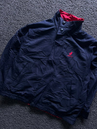 Navy Blue High-Neck Button-Up Jacket with Red Inner Lining and Embroidered Logo