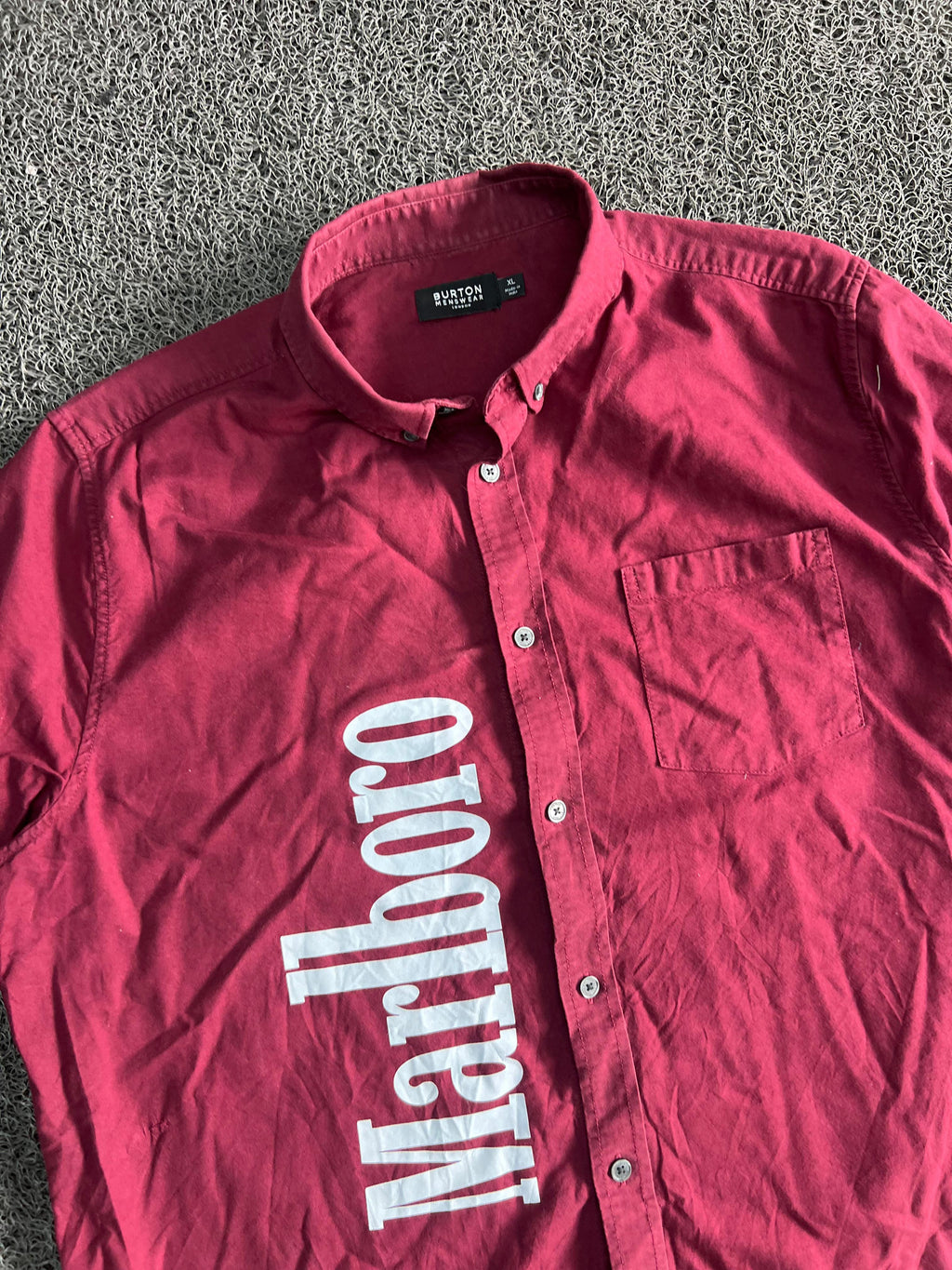 Menswear short-sleeve button-up with a bold Marlboro graphic print.