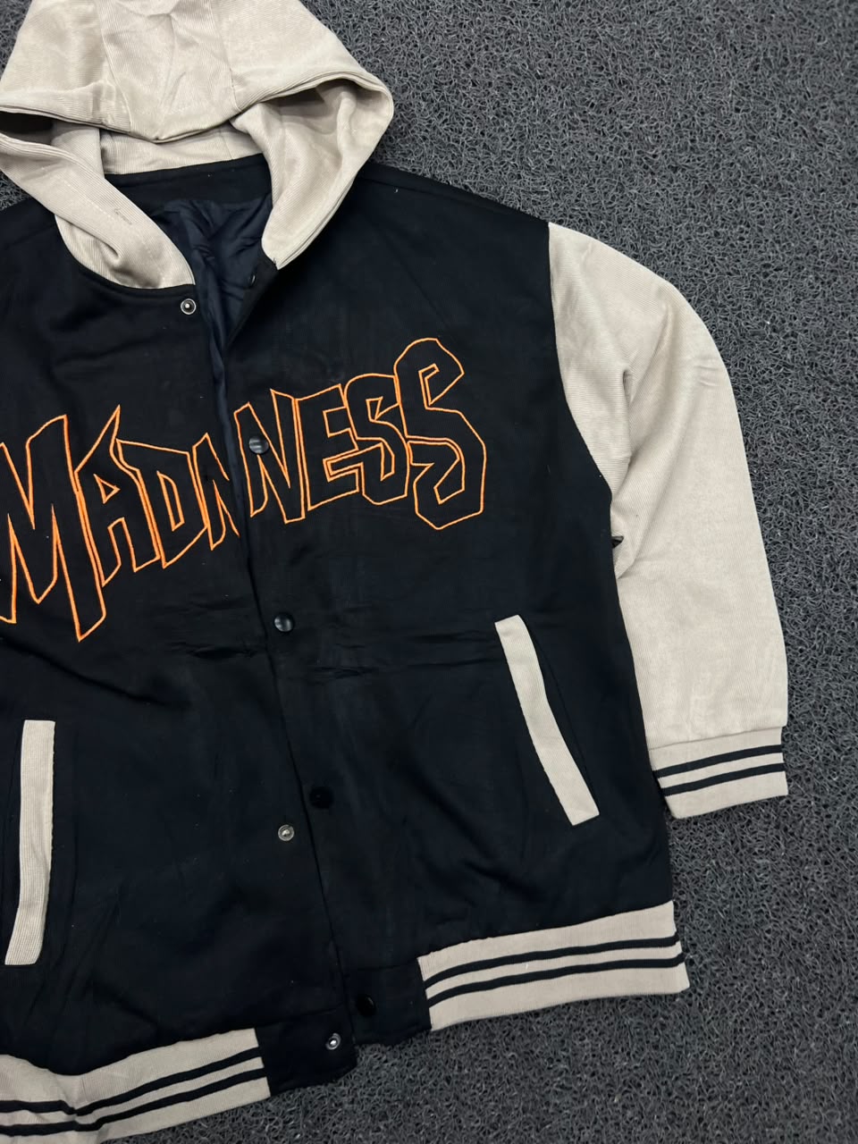 Madness Hooded Varsity Jacket – Black & Cream Snap Button College Jacket ⚠️ No Zip