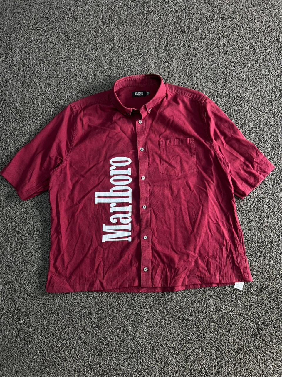Menswear short-sleeve button-up with a bold Marlboro graphic print.